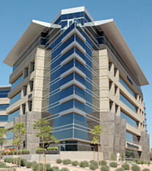 Photo of multi-storyed building with EIFS metal composite and masonry appearance